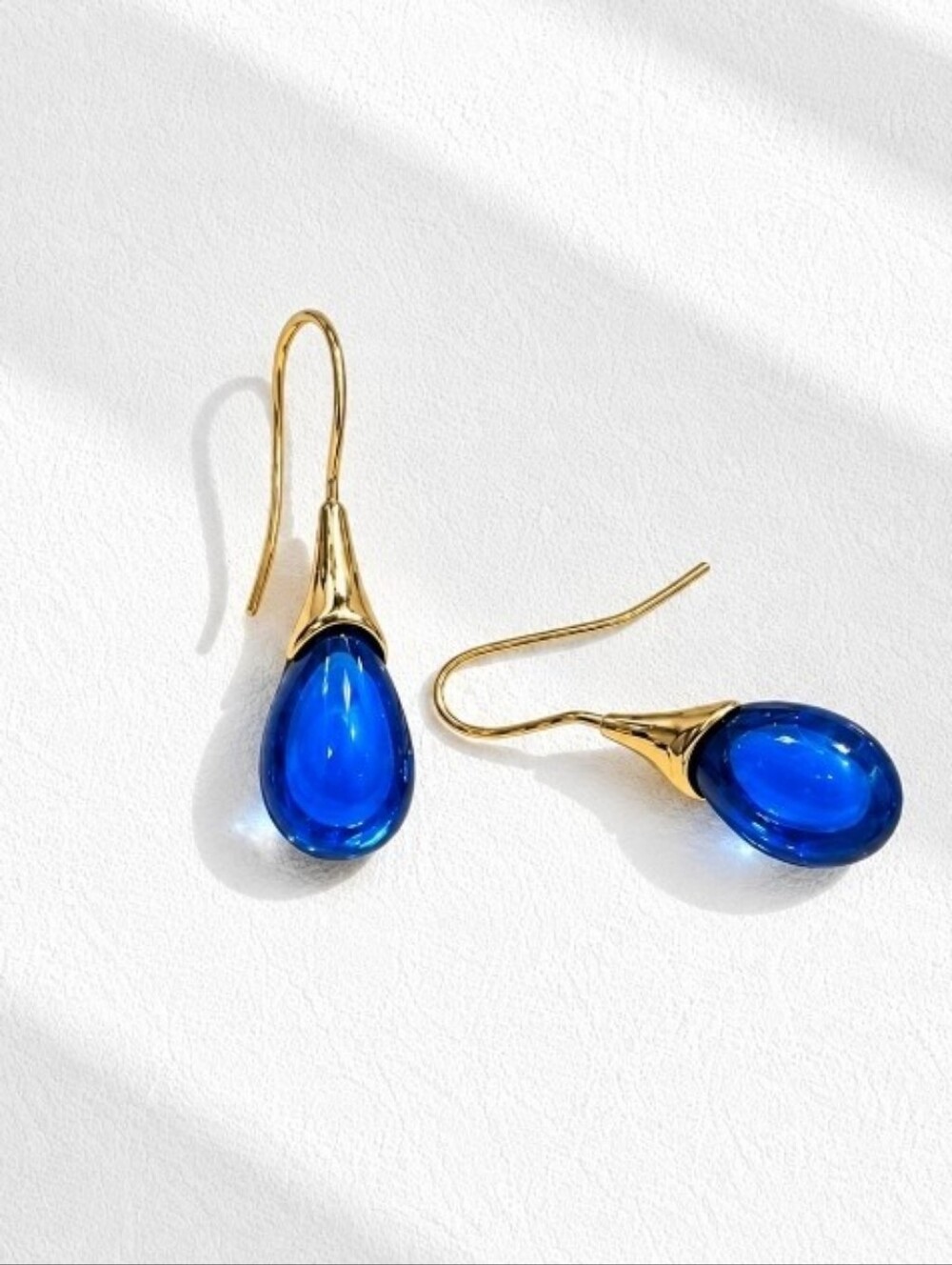 Gold Earrings with Blue Teardrop Stones